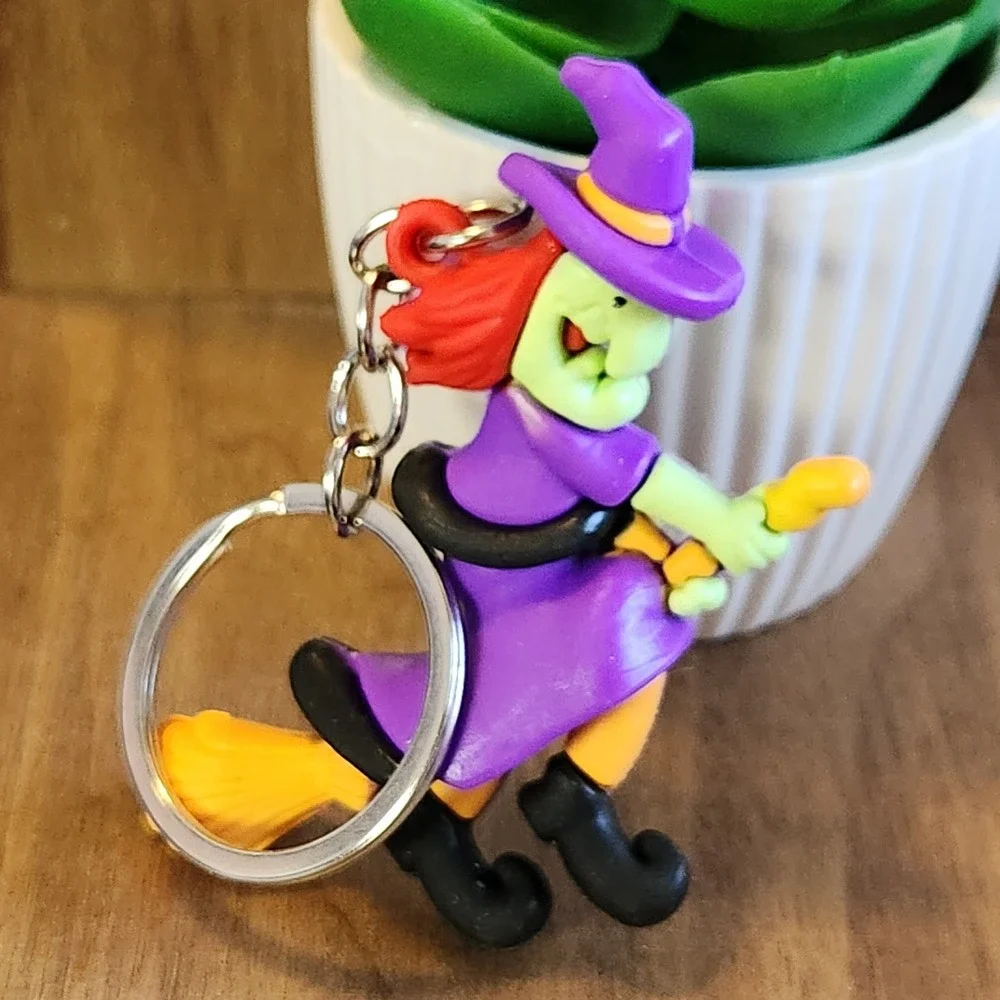 Vintage Style Halloween Witch on Broomstick Keychain Purple Green 2.75
